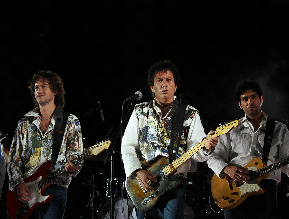 Foto de la banda de rock Soda Stereo actuando en un escenario.