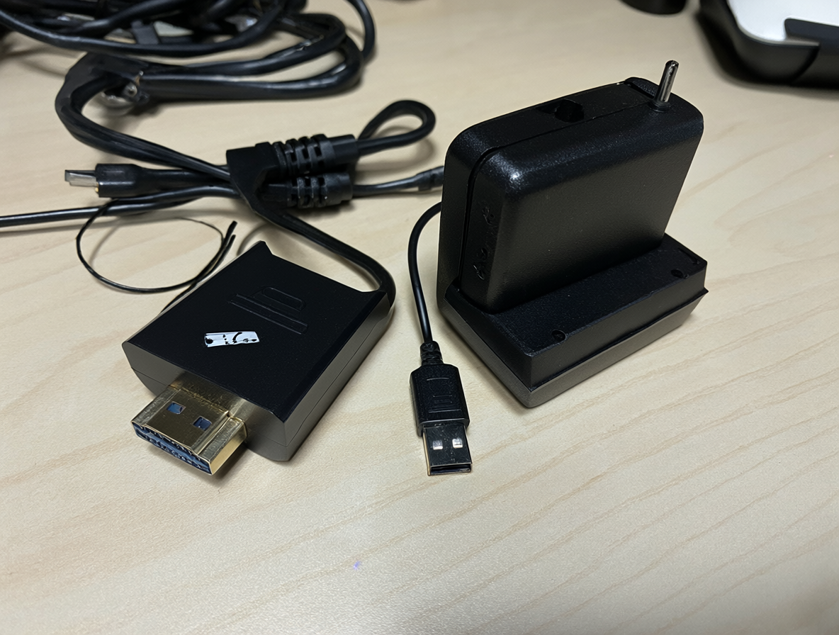 Dispositivo de división de señal HDMI con sus accesorios de alimentación