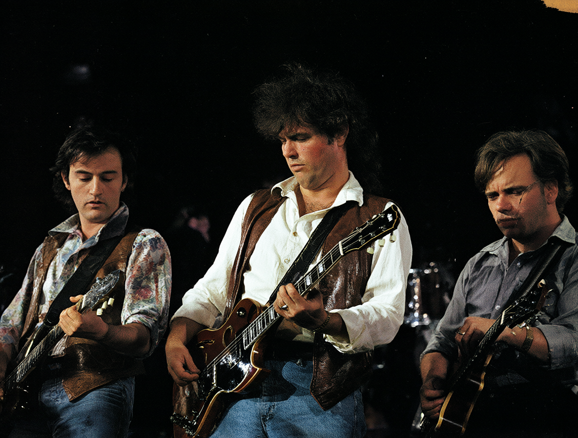 Foto de la banda Yes con el álbum 90125 y una guitarra destacada.