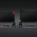 Diagrama técnico mostrando dos cadenas de sonido distintas conectadas a un televisor, comparando la salida Bluetooth con la salida HDMI.