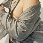 Illustration of a person removing their jacket, highlighting the arm exiting the sleeve.
